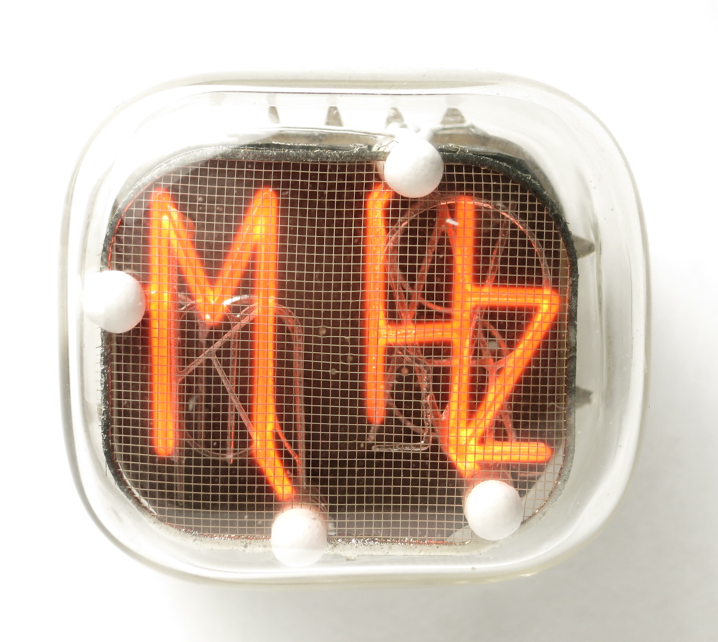 The combined symbol 'MHz' of the IN-XX